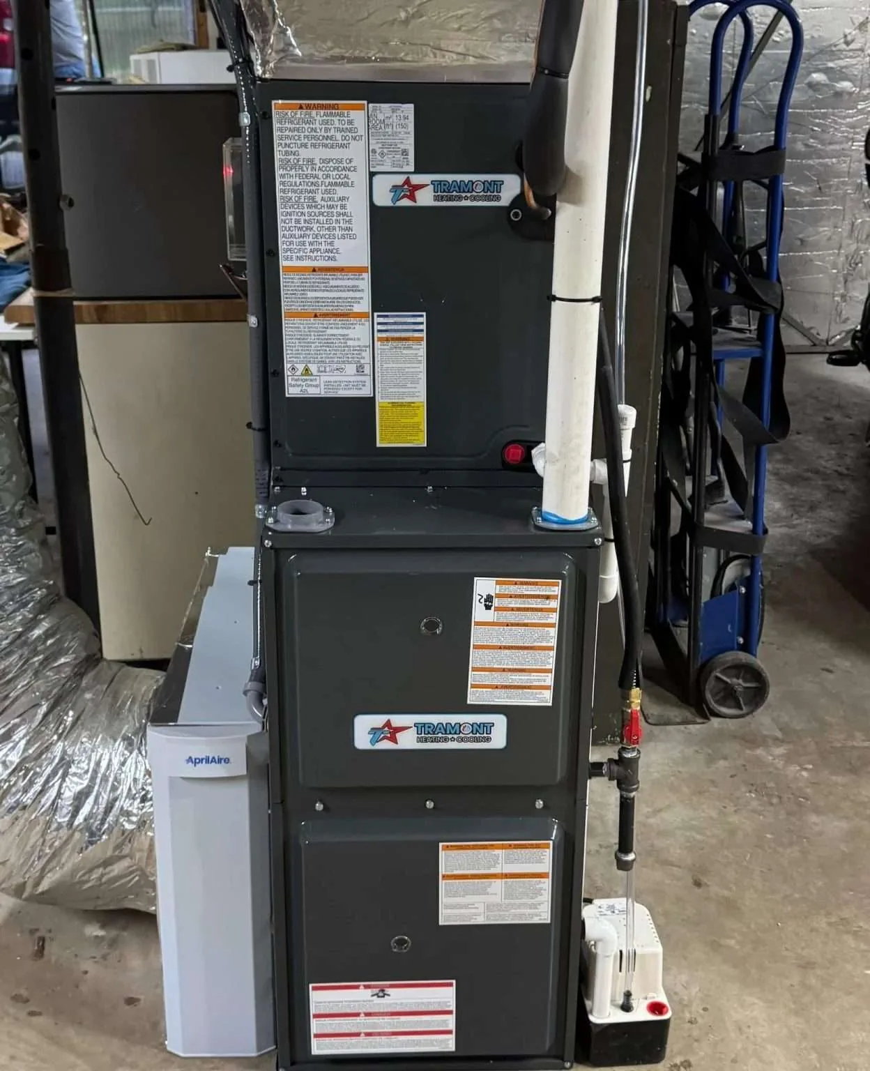 Furnace with Tramont Heating Cooling Plumbing logo